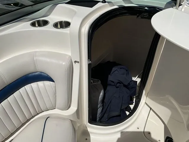 Slide: The Image of Interior of a 2008 Hurricane SunDeck 2000 boat with storage space. - 14