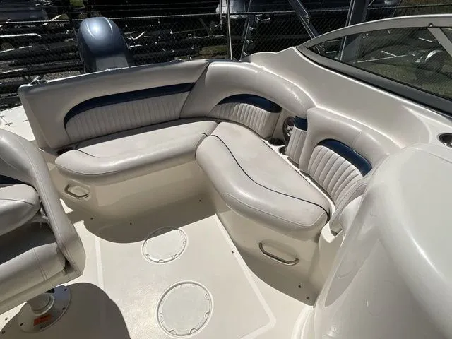 Slide: The Image of Interior of a 2008 Hurricane SunDeck 2000 boat with white seating. - 15