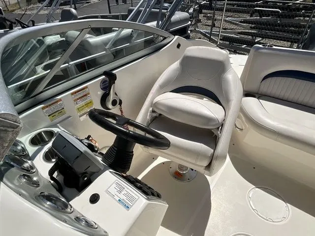 Slide: The Image of Interior of a 2008 Hurricane SunDeck 2000 boat with steering console. - 16