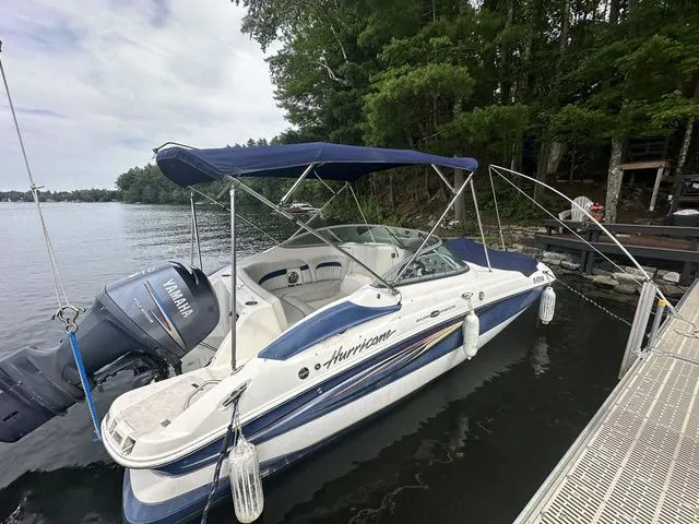 Slide: The Image of 2008 Hurricane SunDeck 2000 boat docked at lakeside. - 23