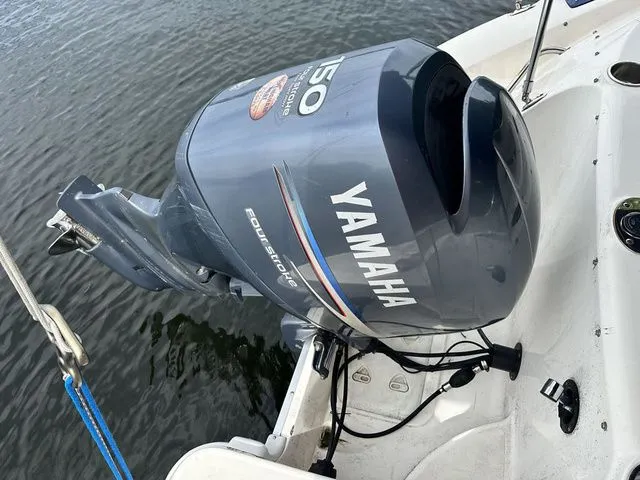 Slide: The Image of Yamaha outboard motor on a 2008 Hurricane SunDeck 2000 boat. - 6