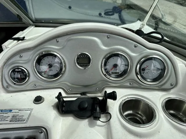 Slide: The Image of Dashboard of a 2008 Hurricane SunDeck 2000 boat with instruments. - 7