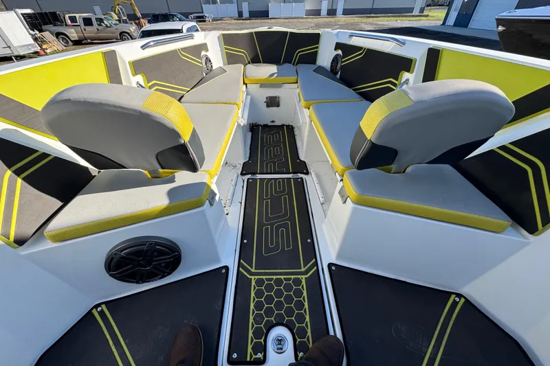 Slide: The Image of Interior of 2022 Scarab 255 Open ID boat with stylish seating and modern design. - 11