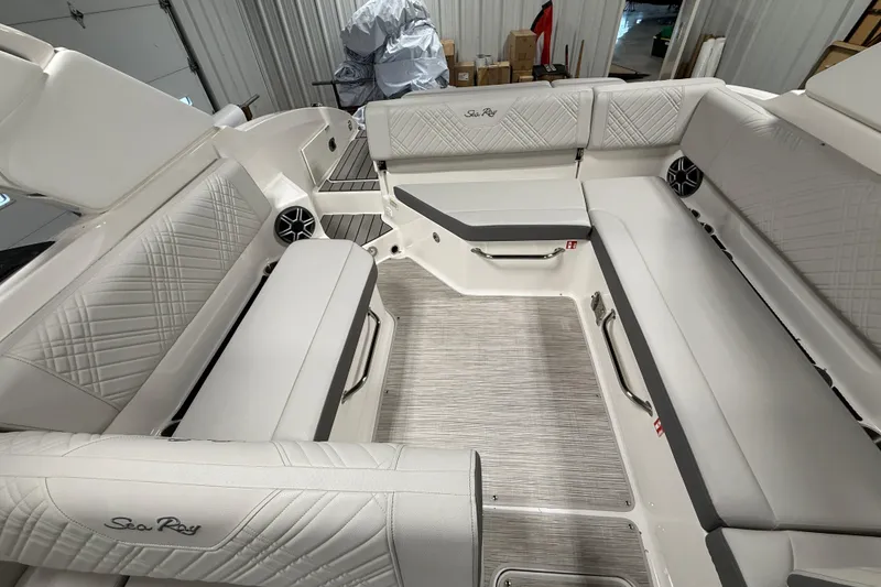 Slide: The Image of 2026 Sea Ray SDX 270 boat interior with luxurious seating and modern design. - 16