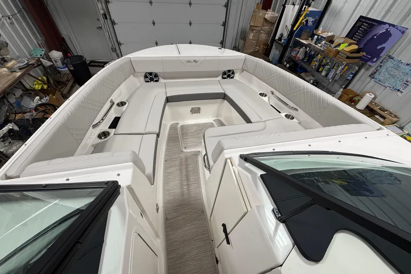 Slide: The Image of 2026 Sea Ray SDX 270 boat interior with spacious seating and modern design. - 22