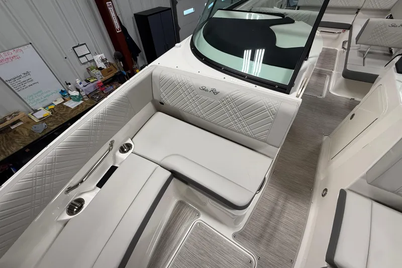 Slide: The Image of Interior of 2026 Sea Ray SDX 270 boat with luxurious seating and modern design. - 25
