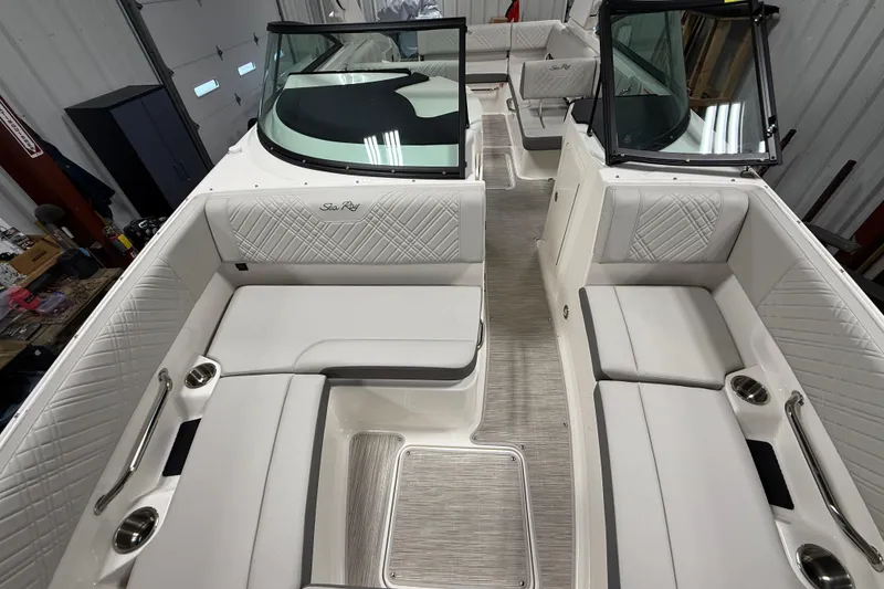 Slide: The Image of 2026 Sea Ray SDX 270 boat interior with luxurious seating and modern design. - 26