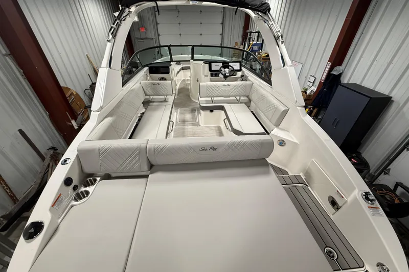 Slide: The Image of 2026 Sea Ray SDX 270 boat interior with spacious seating and modern design. - 7