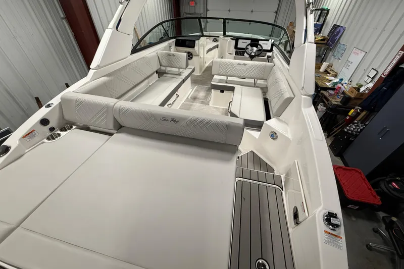 Slide: The Image of 2026 Sea Ray SDX 270 boat interior with luxurious seating and modern design. - 8