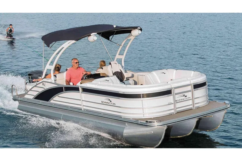 The Image of Manufacturer Provided Image: 2020 Bennington R 25 RFB pontoon boat cruising on water. - 0
