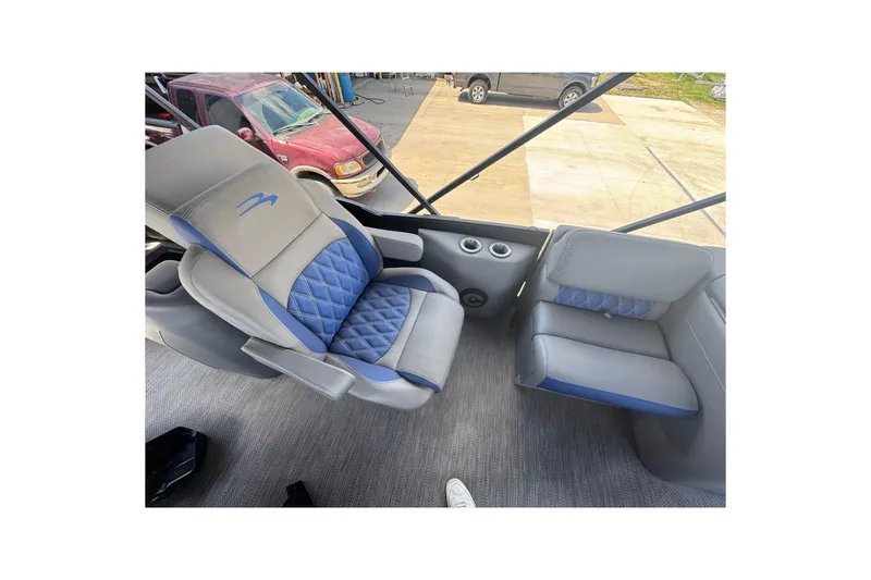 Slide: The Image of 2020 Bennington R 25 RFB boat interior with luxurious seating and modern design. - 14