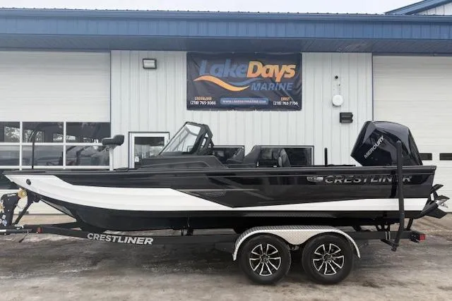 The Image of 2026 Crestliner 2050 Fish Hawk boat on trailer outside Lake Days Marine. - 1