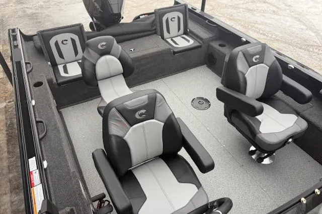 Slide: The Image of 2026 Crestliner 2050 Fish Hawk boat interior with modern seating and spacious layout. - 12