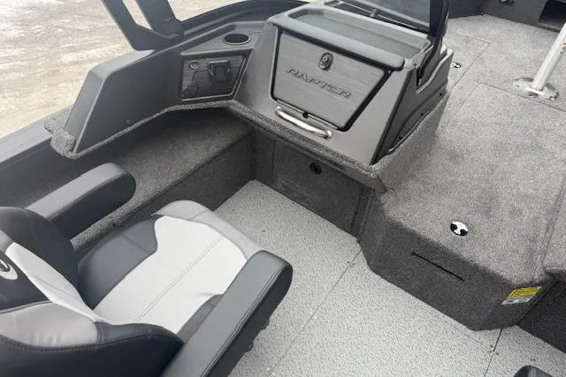 Slide: The Image of Interior of 2026 Crestliner 2050 Fish Hawk boat with seating and storage. - 23