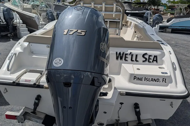 Slide: The Image of 2022 Key West 219 FS boat with 175 engine, "We'll Sea" text, Pine Island, FL. - 4