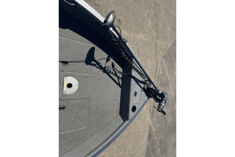 Slide: The Image of 2014 Crestliner 1650 Fish Hawk boat deck with trolling motor. - 12