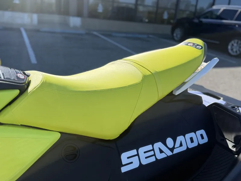 Slide: The Image of 2024 Sea-Doo Spark 3up Trixx with bright yellow seat. - 10