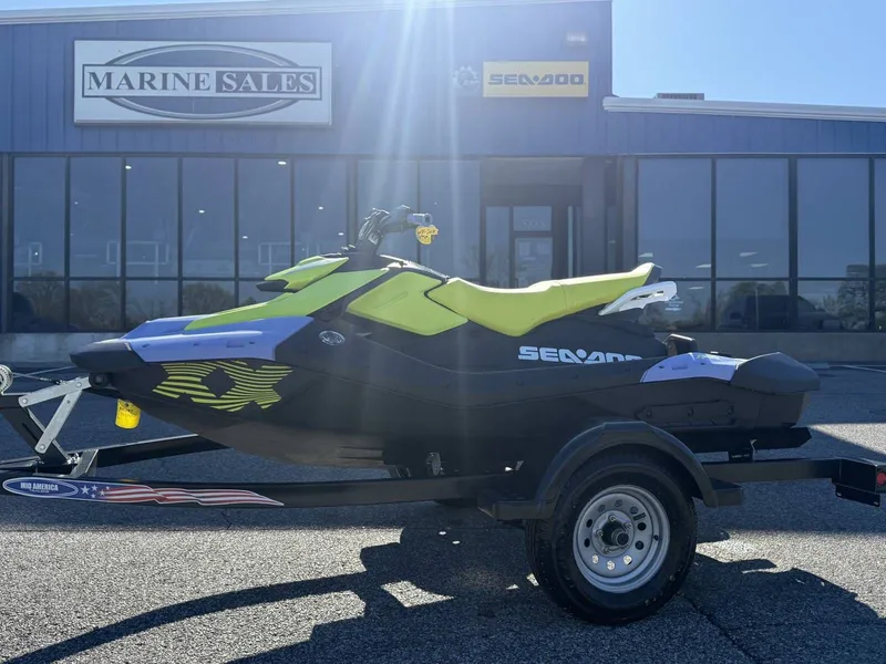 Slide: The Image of 2024 Sea-Doo Spark 3up Trixx in front of Marine Sales building. - 15