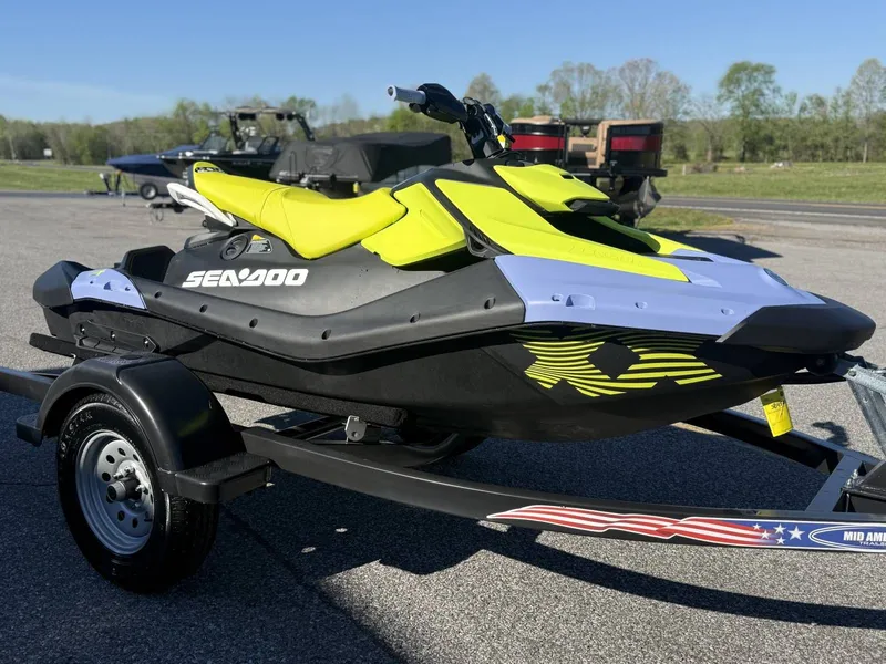 Slide: The Image of 2024 Sea-Doo Spark 3up Trixx jet ski on trailer. - 17