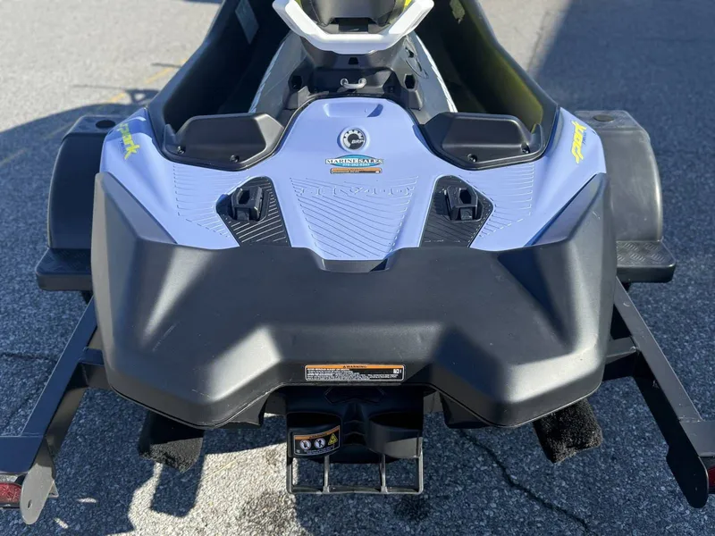 Slide: The Image of 2024 Sea-Doo Spark 3up Trixx on trailer, rear view. - 18