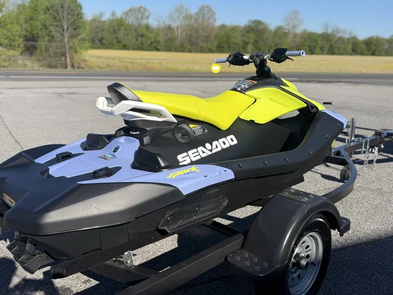 Slide: The Image of 2024 Sea-Doo Spark 3up Trixx on trailer, yellow-black. - 19
