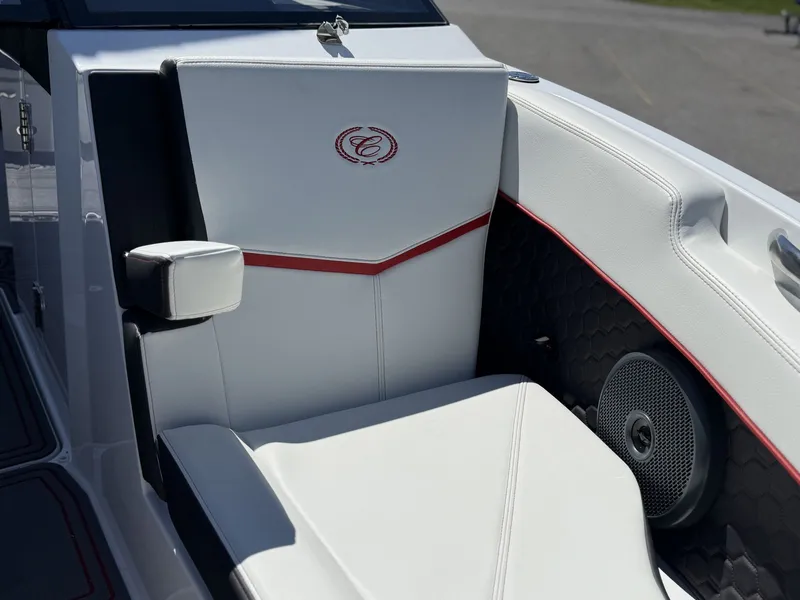 Slide: The Image of Interior of 2026 Cobalt R6 Surf with white seating and speaker. - 10