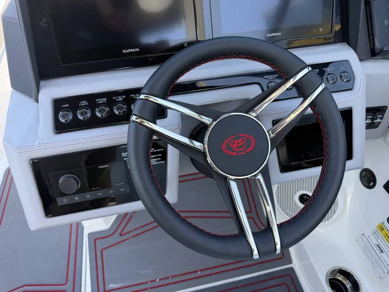 Slide: The Image of Steering wheel of 2026 Cobalt R6 Surf with Garmin displays. - 16