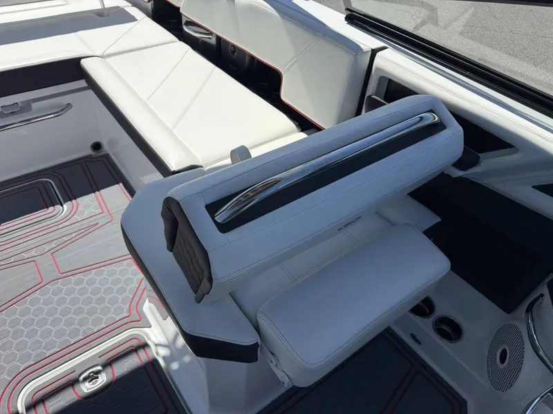 Slide: The Image of Interior of 2026 Cobalt R6 Surf with luxurious white seating. - 24