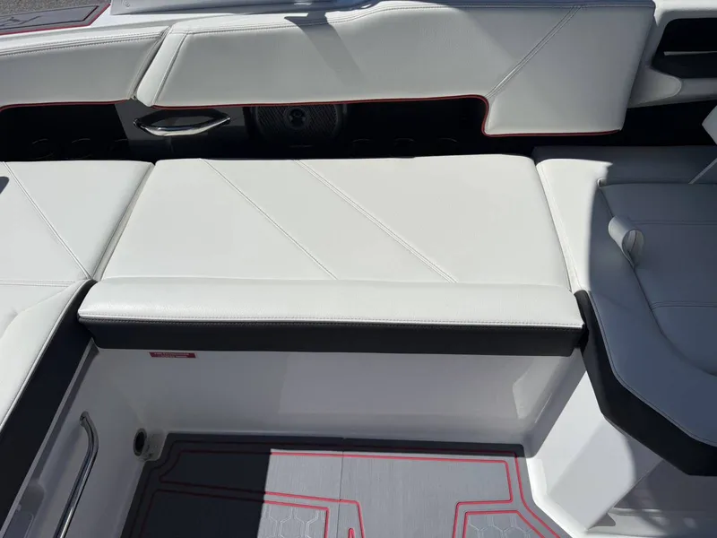 Slide: The Image of Interior of 2026 Cobalt R6 Surf with white leather seating. - 26