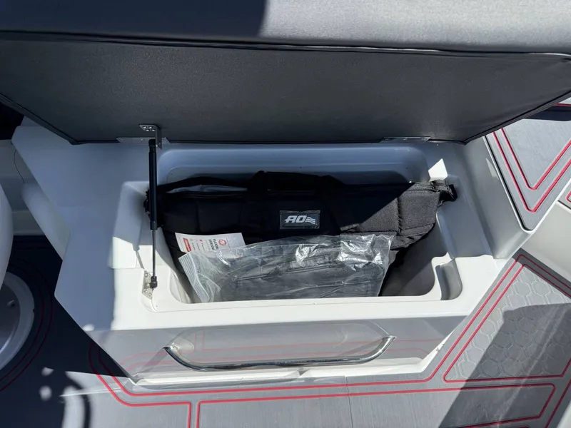 Slide: The Image of Storage compartment in Cobalt R6 Surf boat, 2026 model. - 28