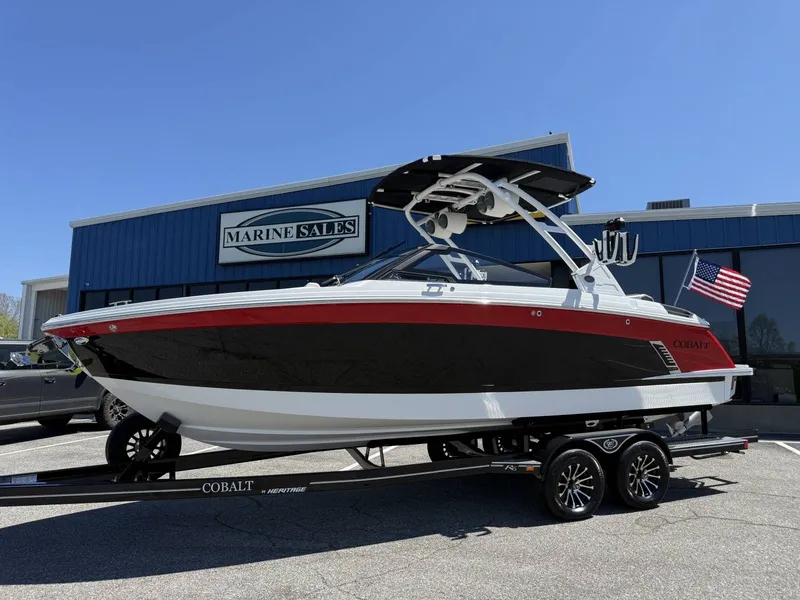 Slide: The Image of 2026 Cobalt R6 Surf boat in front of Marine Sales building. - 3