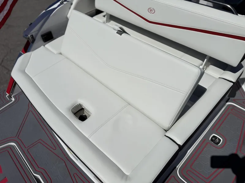 Slide: The Image of Cobalt R6 Surf 2026 boat with white cushioned seat. - 33