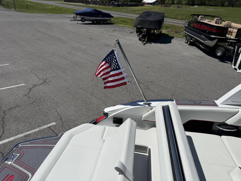 Slide: The Image of Cobalt R6 Surf 2026 with American flag on parking lot. - 34