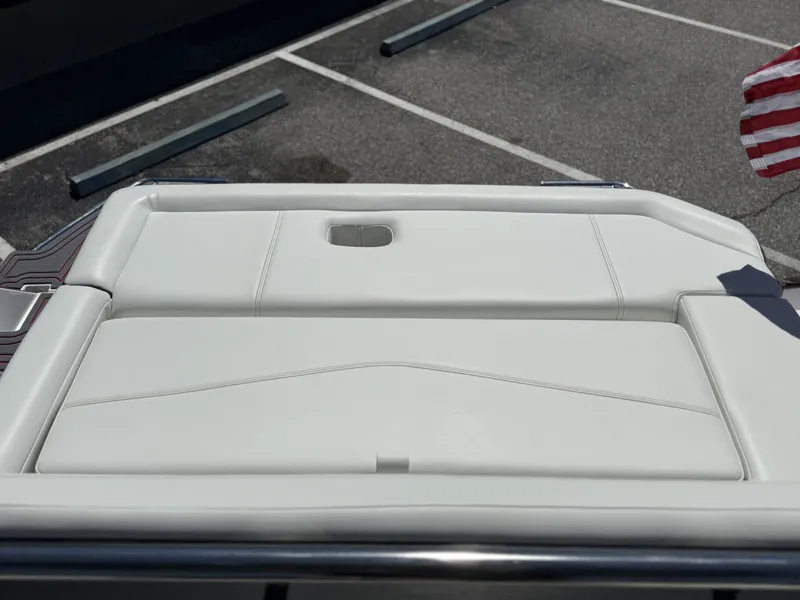 Slide: The Image of Rear view of 2026 Cobalt R6 Surf boat with white upholstery. - 35