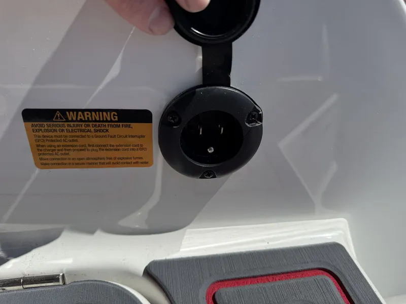 Slide: The Image of Warning label and socket on Cobalt R6 Surf 2026 boat. - 39