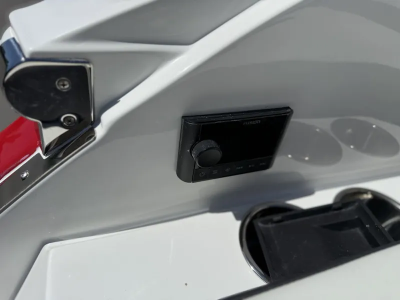 Slide: The Image of Cobalt R6 Surf 2026 boat console with Fusion audio system. - 42