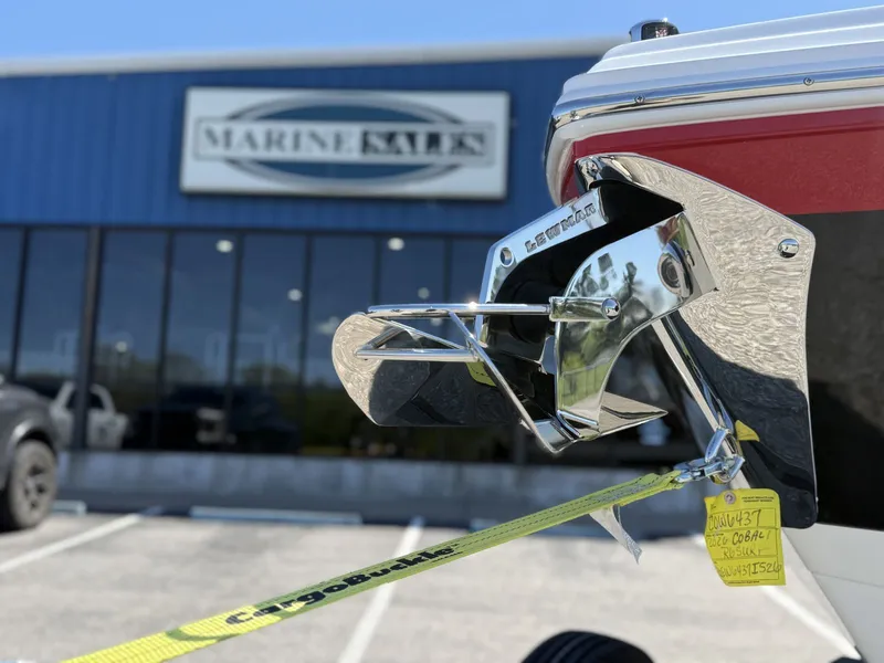 Slide: The Image of Cobalt R6 Surf 2026 boat outside Marine Sales building. - 6