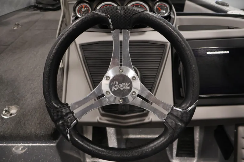 Slide: The Image of Steering wheel of 2022 Ranger 1880MS boat with dashboard instruments. - 22
