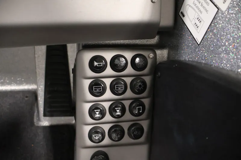 Slide: The Image of Control panel of 2022 Ranger 1880MS boat with various function buttons. - 25