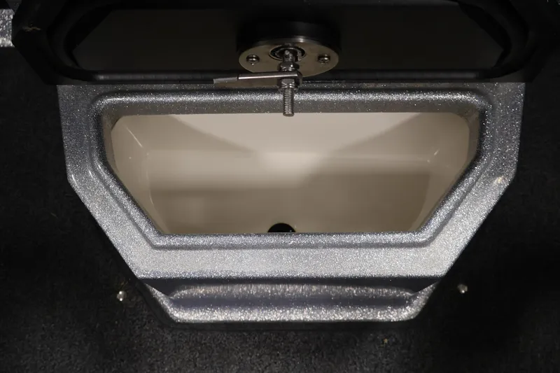 Slide: The Image of 2022 Ranger 1880MS boat storage compartment with secure latch, interior view. - 27