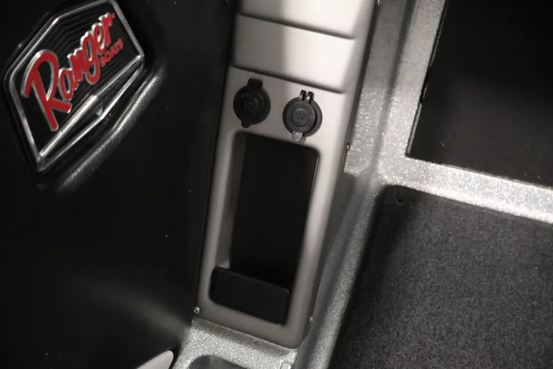Slide: The Image of Interior of 2022 Ranger 1880MS boat featuring logo and power outlets. - 29