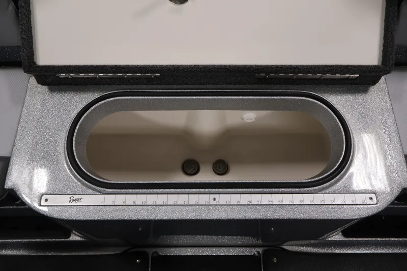 Slide: The Image of 2022 Ranger 1880MS boat livewell with measuring ruler, open lid view. - 35