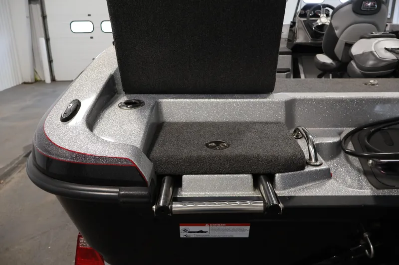 Slide: The Image of 2022 Ranger 1880MS boat interior with ladder and storage compartment. - 36