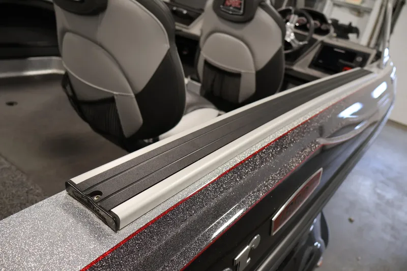 Slide: The Image of 2022 Ranger 1880MS boat interior with sleek seating and modern dashboard design. - 38