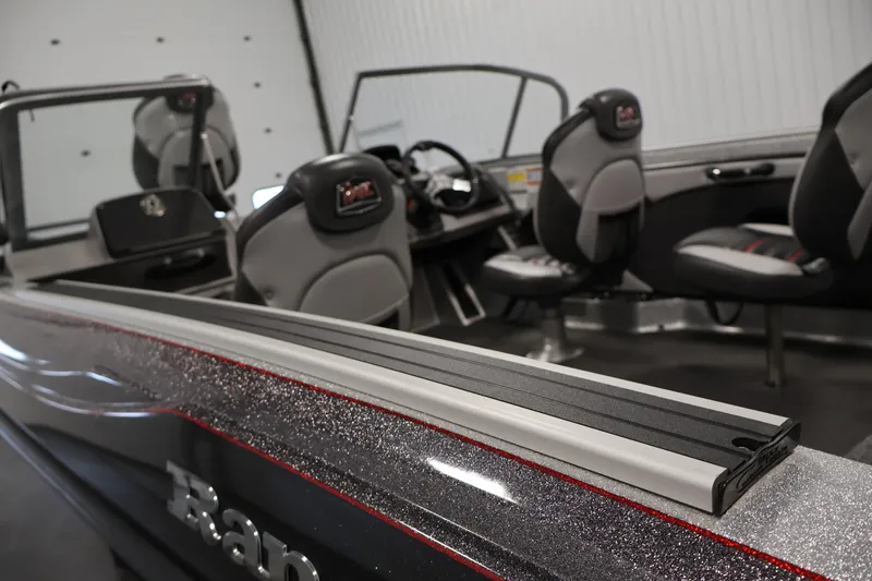 Slide: The Image of 2022 Ranger 1880MS boat interior with sleek seating and modern design. - 39