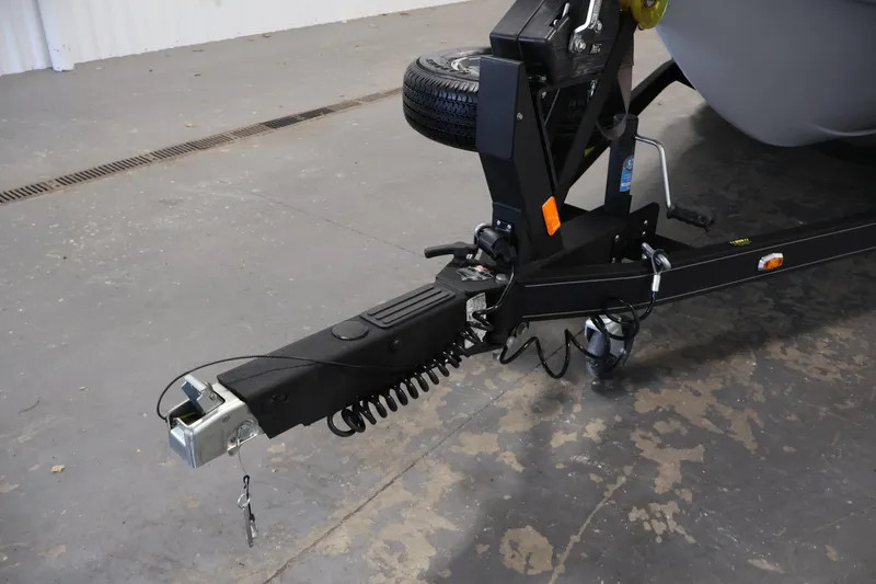 Slide: The Image of Trailer hitch of a 2022 Ranger 1880MS boat in a garage setting. - 45