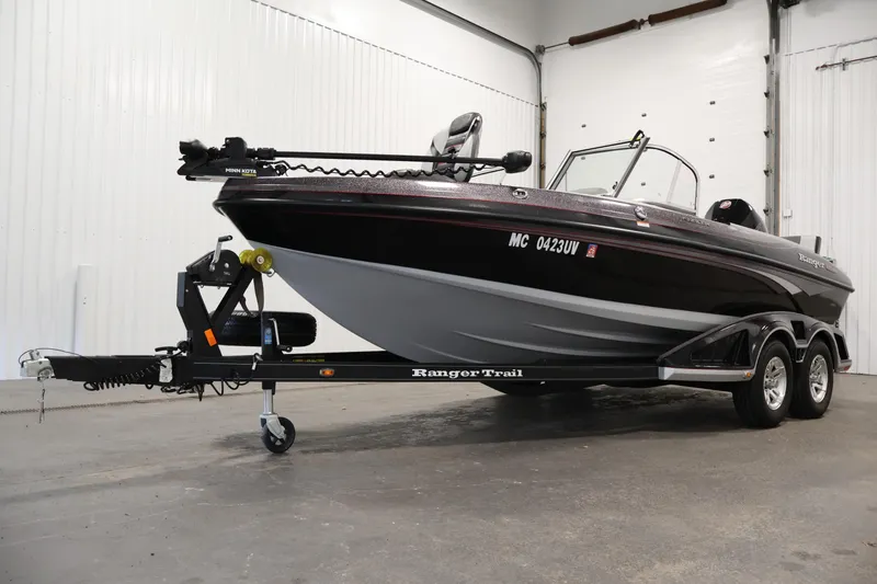 Slide: The Image of 2022 Ranger 1880MS boat on trailer in indoor setting. - 47