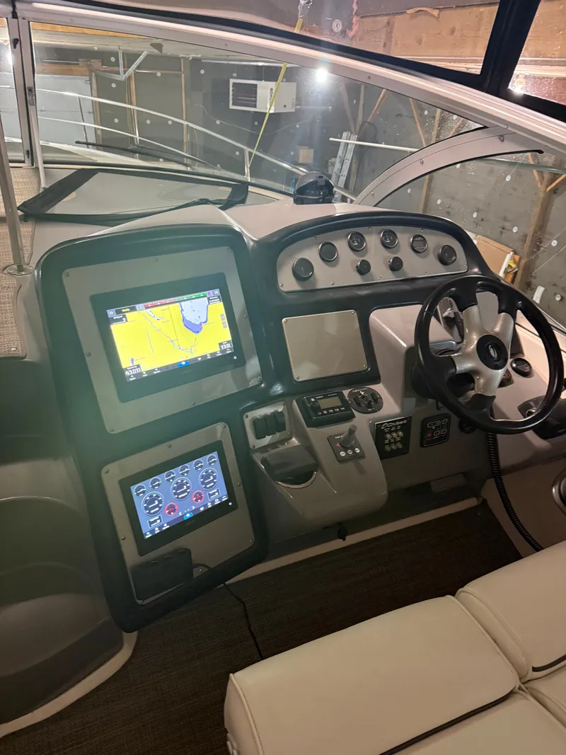 Slide: The Image of Interior view of 2006 Cruisers Yachts 420 Express cockpit. - 10