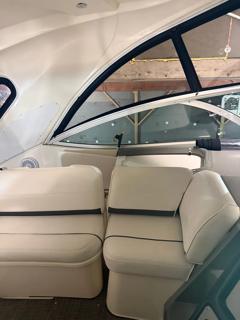 Slide: The Image of Interior of 2006 Cruisers Yachts 420 Express with beige seating. - 14