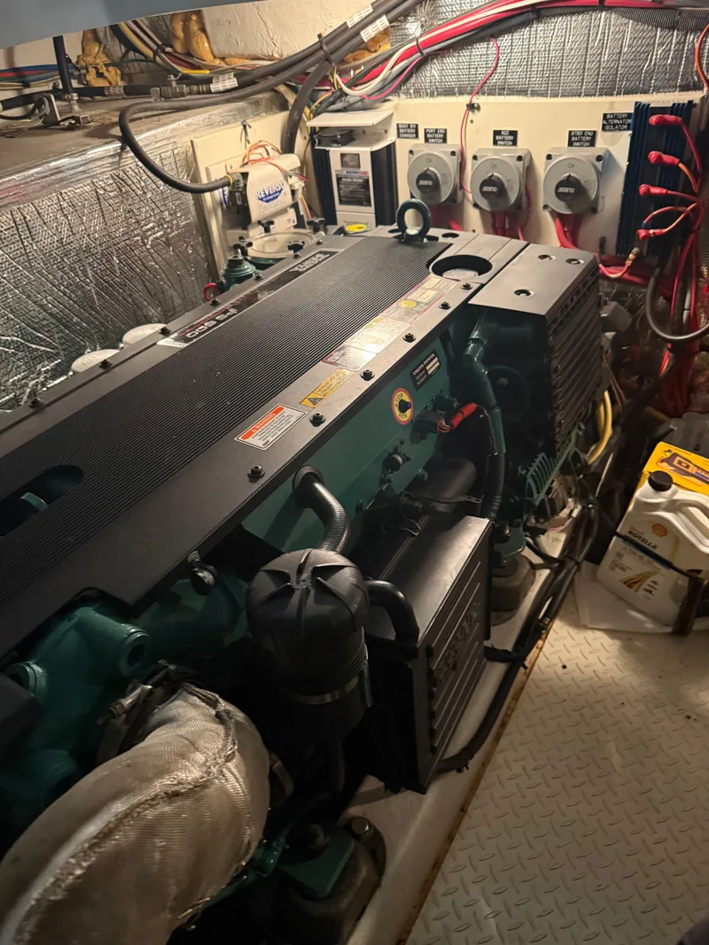 Slide: The Image of Engine room of a 2006 Cruisers Yachts 420 Express with wiring. - 18